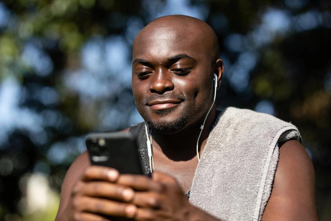 nigerian-man-on-phone